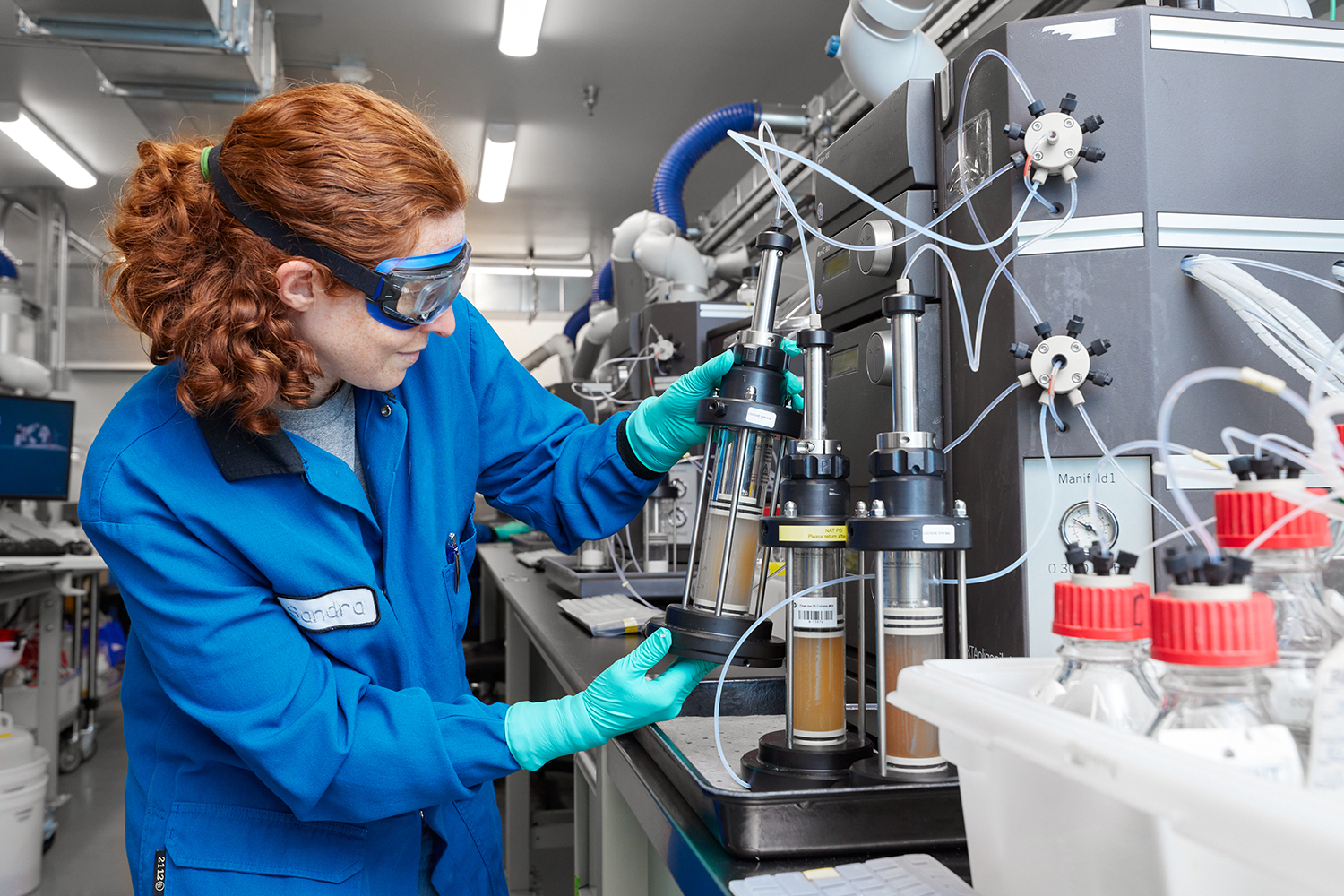 Image shows scientist working in product development at Axolabs Petaluma site